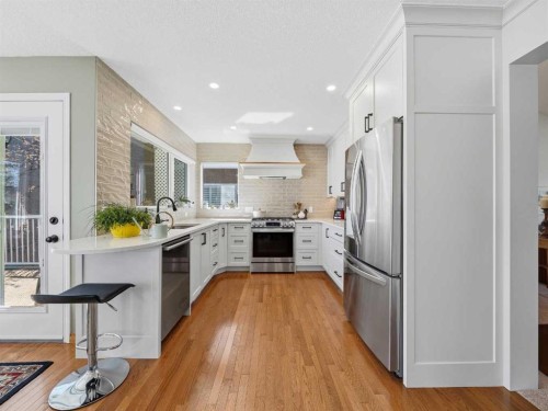 208 Shawnee Gardens Sw, Calgary, AB - Indoor Photo Showing Kitchen With Stainless Steel Kitchen With Upgraded Kitchen