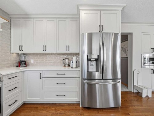 208 Shawnee Gardens Sw, Calgary, AB - Indoor Photo Showing Kitchen With Stainless Steel Kitchen With Upgraded Kitchen