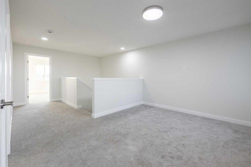 182 Sora Way Se, Calgary, AB - Indoor Photo Showing Other Room