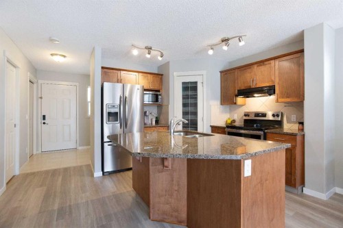 30 Cranwell Common Se, Calgary, AB - Indoor Photo Showing Kitchen With Double Sink