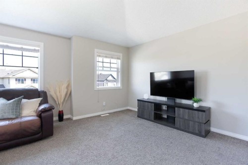 403 Morningside Way Sw, Airdrie, AB - Indoor Photo Showing Living Room