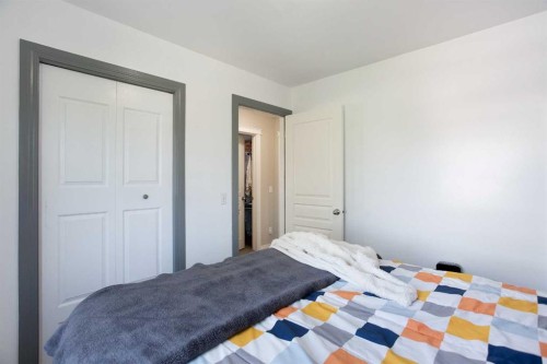403 Morningside Way Sw, Airdrie, AB - Indoor Photo Showing Bedroom