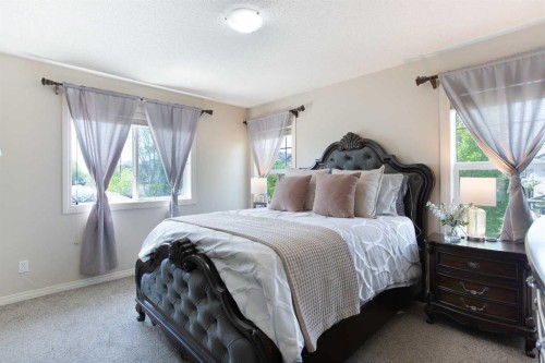 403 Morningside Way Sw, Airdrie, AB - Indoor Photo Showing Bedroom