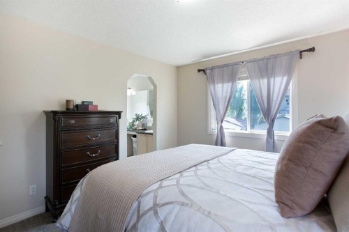 403 Morningside Way Sw, Airdrie, AB - Indoor Photo Showing Bedroom