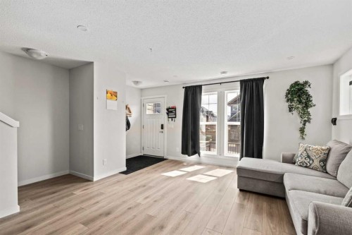463 Cranbrook Square Se, Calgary, AB - Indoor Photo Showing Living Room