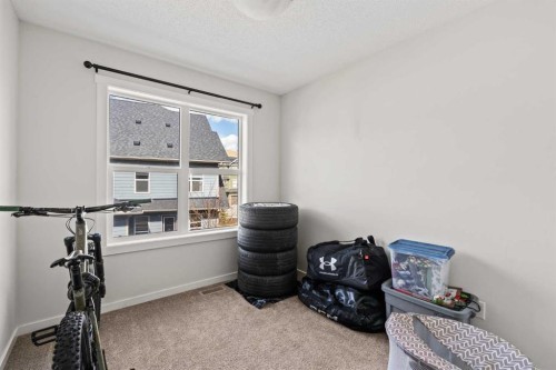 463 Cranbrook Square Se, Calgary, AB - Indoor Photo Showing Gym Room