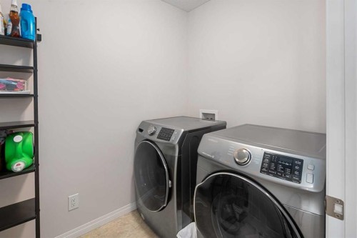 295 Carrington Circle Nw, Calgary, AB - Indoor Photo Showing Laundry Room