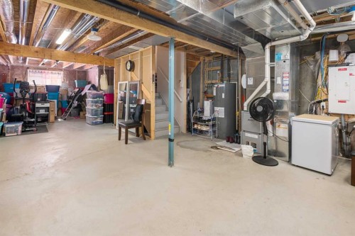 295 Carrington Circle Nw, Calgary, AB - Indoor Photo Showing Basement