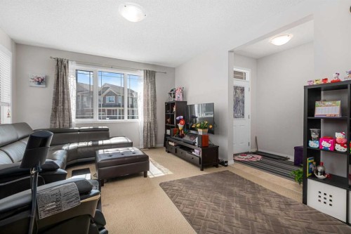295 Carrington Circle Nw, Calgary, AB - Indoor Photo Showing Living Room