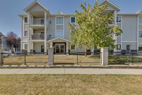 301-7301 Valleyview Park Se, Calgary, AB - Outdoor With Facade