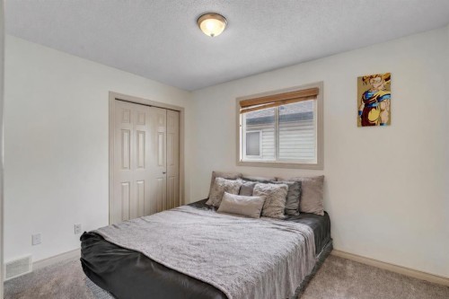 133 Everwoods Close Sw, Calgary, AB - Indoor Photo Showing Bedroom