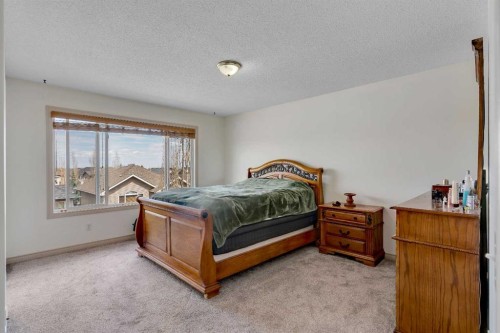 133 Everwoods Close Sw, Calgary, AB - Indoor Photo Showing Bedroom
