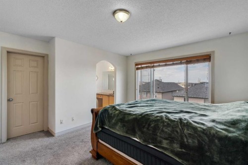133 Everwoods Close Sw, Calgary, AB - Indoor Photo Showing Bedroom