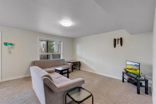 133 Everwoods Close Sw, Calgary, AB - Indoor Photo Showing Living Room