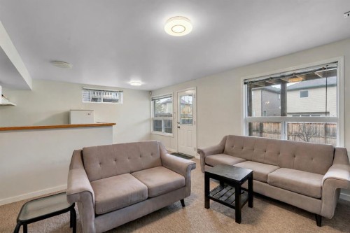 133 Everwoods Close Sw, Calgary, AB - Indoor Photo Showing Living Room
