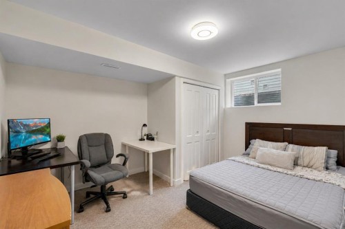 133 Everwoods Close Sw, Calgary, AB - Indoor Photo Showing Bedroom