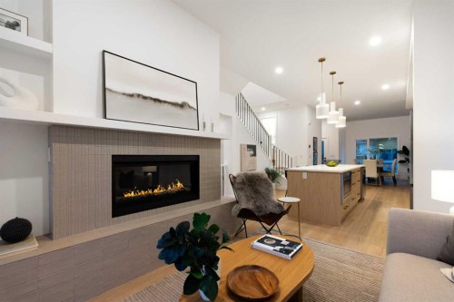 2-8916 33 Avenue, Calgary, AB - Indoor Photo Showing Living Room With Fireplace