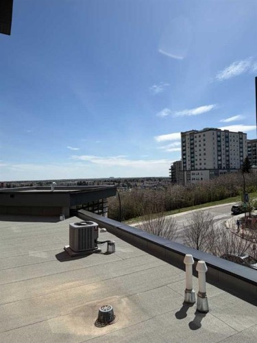 402-30 Shawnee Common Sw, Calgary, AB - Outdoor