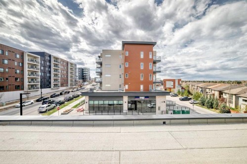 402-30 Shawnee Common Sw, Calgary, AB - Outdoor With Balcony
