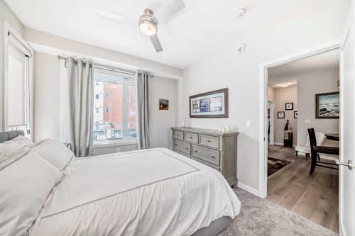 402-30 Shawnee Common Sw, Calgary, AB - Indoor Photo Showing Bedroom