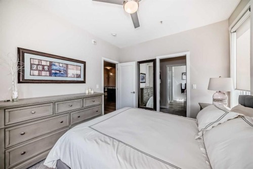 402-30 Shawnee Common Sw, Calgary, AB - Indoor Photo Showing Bedroom