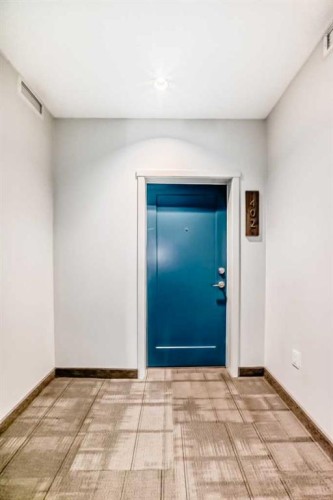 402-30 Shawnee Common Sw, Calgary, AB - Indoor Photo Showing Other Room