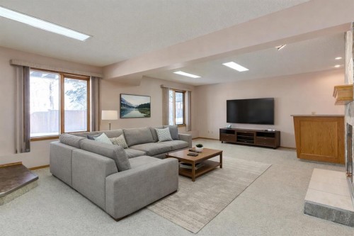420 Hawkview Manor Circle Nw, Calgary, AB - Indoor Photo Showing Living Room