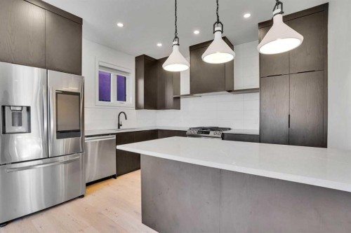402 26 Avenue Nw, Calgary, AB - Indoor Photo Showing Kitchen With Stainless Steel Kitchen With Upgraded Kitchen