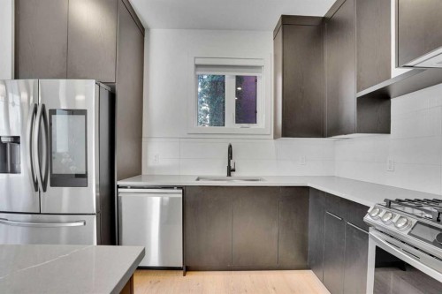 402 26 Avenue Nw, Calgary, AB - Indoor Photo Showing Kitchen With Stainless Steel Kitchen