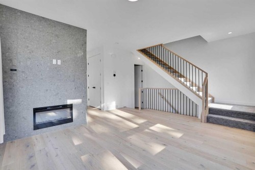 402 26 Avenue Nw, Calgary, AB - Indoor With Fireplace