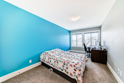 88 Masters Way Se, Calgary, AB - Indoor Photo Showing Bedroom