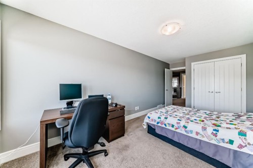 88 Masters Way Se, Calgary, AB - Indoor Photo Showing Bedroom