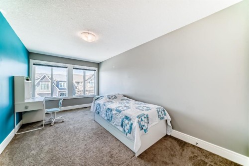 88 Masters Way Se, Calgary, AB - Indoor Photo Showing Bedroom