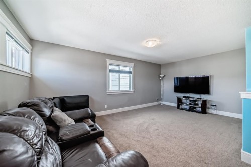 88 Masters Way Se, Calgary, AB - Indoor Photo Showing Living Room