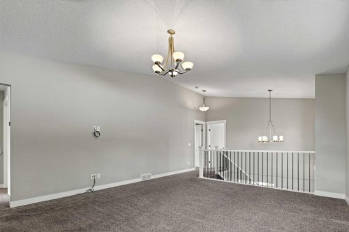 48 Evansfield Manor Nw, Calgary, AB - Indoor Photo Showing Other Room