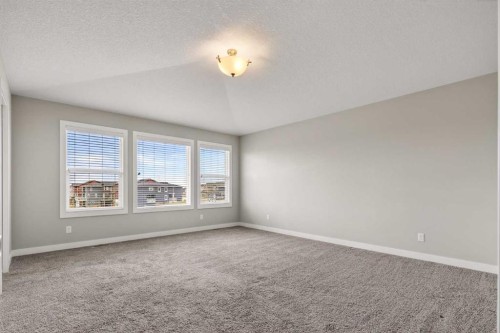 48 Evansfield Manor Nw, Calgary, AB - Indoor Photo Showing Other Room