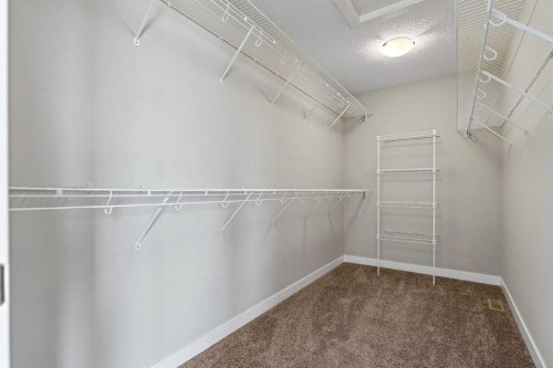 48 Evansfield Manor Nw, Calgary, AB - Indoor With Storage