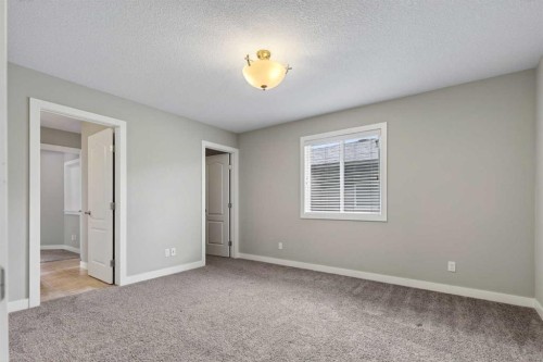 48 Evansfield Manor Nw, Calgary, AB - Indoor Photo Showing Other Room