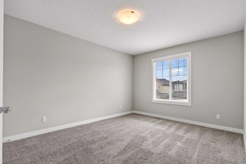 48 Evansfield Manor Nw, Calgary, AB - Indoor Photo Showing Other Room