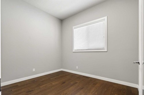 48 Evansfield Manor Nw, Calgary, AB - Indoor Photo Showing Other Room