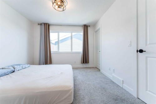 76 Lucas Boulevard Nw, Calgary, AB - Indoor Photo Showing Bedroom