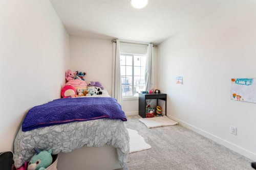 76 Lucas Boulevard Nw, Calgary, AB - Indoor Photo Showing Bedroom