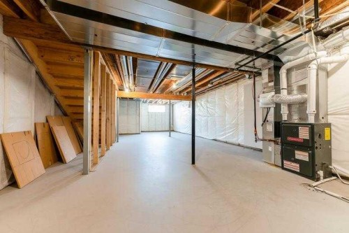 76 Lucas Boulevard Nw, Calgary, AB - Indoor Photo Showing Basement
