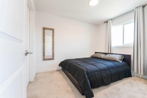 76 Lucas Boulevard Nw, Calgary, AB - Indoor Photo Showing Bedroom