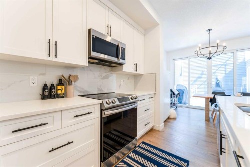 76 Lucas Boulevard Nw, Calgary, AB - Indoor Photo Showing Kitchen With Upgraded Kitchen