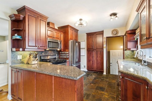 26 Galway Crescent Sw, Calgary, AB - Indoor Photo Showing Kitchen With Double Sink