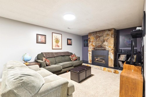 26 Galway Crescent Sw, Calgary, AB - Indoor Photo Showing Living Room With Fireplace