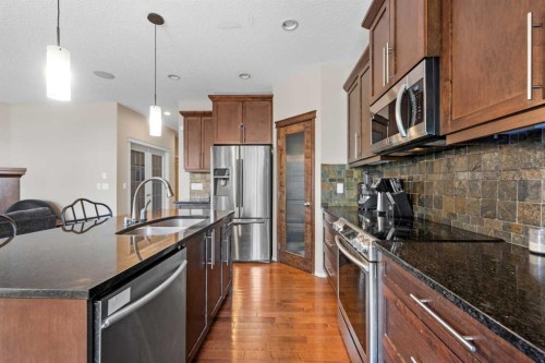 16 Cranarch Grove Se, Calgary, AB - Indoor Photo Showing Kitchen With Stainless Steel Kitchen With Double Sink With Upgraded Kitchen