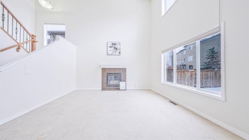 393 Windermere Drive, Chestermere, AB - Indoor With Fireplace