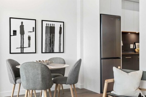 Package #1-730 2 Avenue Sw, Calgary, AB - Indoor Photo Showing Dining Room